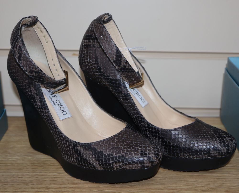 A pair of Jimmy Chou grey snakeskin high platform shoes with ankle strap, size 37.5